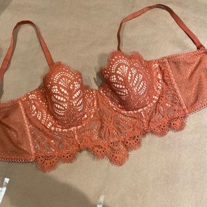 Victoria’s Secret burnt orange colored/ Lacey details bra